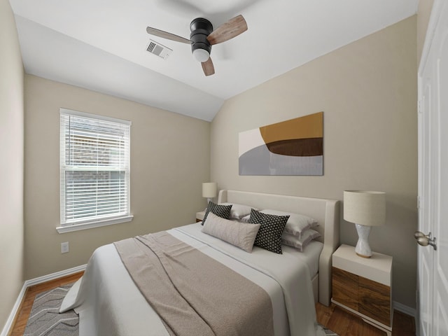 3009 Kurth Canyon Ct, League City, TX 77573 - bedroom with wood finished floors, baseboards, ceiling fan, and lofted ceiling