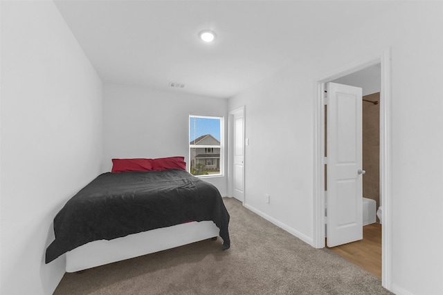 16435 Valerie Marie Pl, Conroe, TX 77306 - carpeted bedroom featuring baseboards and visible vents