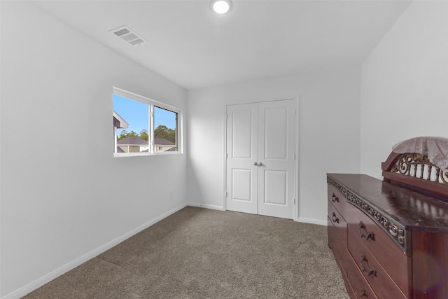 16435 Valerie Marie Pl, Conroe, TX 77306 - bedroom featuring baseboards, carpet, a closet, and visible vents