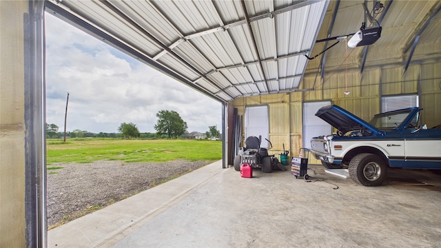 garage featuring a garage door opener