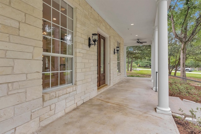 view of patio / terrace with a porch and a ceiling fan