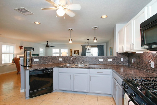 kitchen featuring a sink, a ceiling fan, light tile patterned floors, visible vents, and black appliances