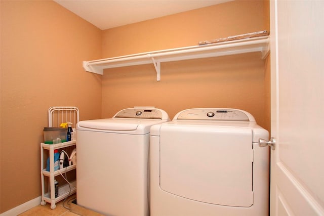 washroom featuring laundry area and independent washer and dryer