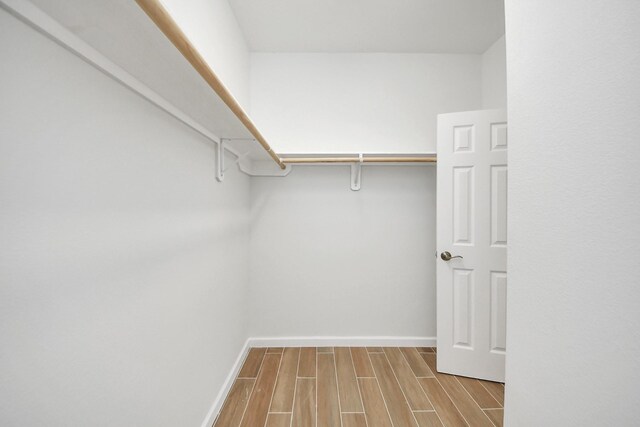 326 Gans St Unit A, Houston, TX 77029 - walk in closet with wood tiled floor