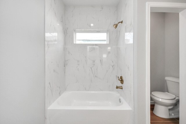 326 Gans St Unit A, Houston, TX 77029 - full bathroom with toilet and shower / washtub combination