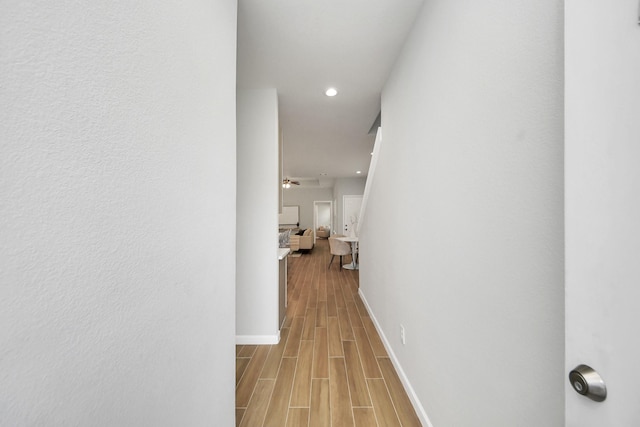 326 Gans St Unit A, Houston, TX 77029 - corridor with baseboards, recessed lighting, and wood finished floors