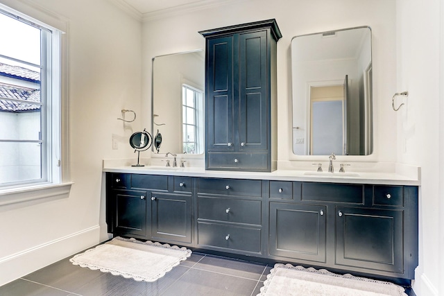 bathroom featuring plenty of natural light and a sink