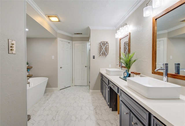 bathroom featuring a sink, ornamental molding, a soaking tub, and double vanity