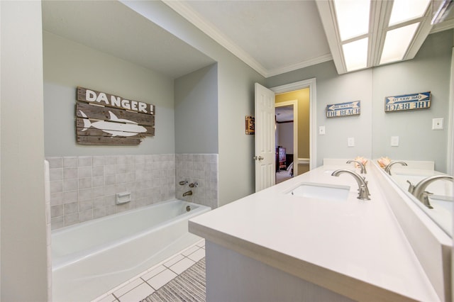 bathroom with vanity, crown molding, tile patterned flooring, and a garden tub