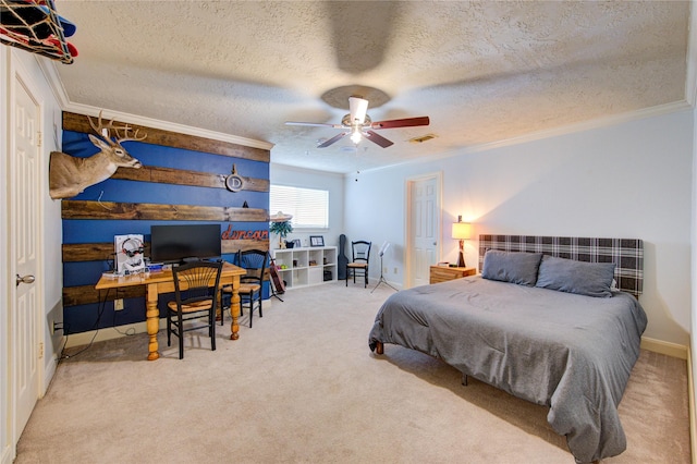 bedroom with carpet floors, a textured ceiling, and ornamental molding