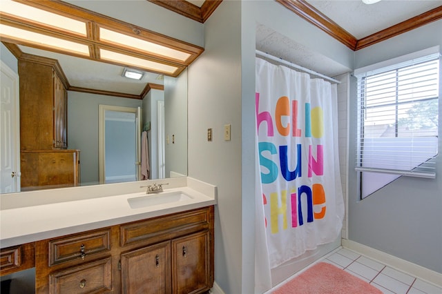 full bath with vanity, ornamental molding, baseboards, and tile patterned flooring