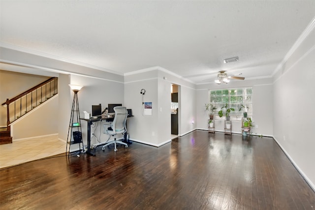 office area featuring baseboards, a ceiling fan, wood finished floors, and visible vents