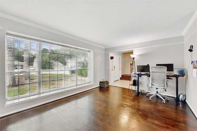 office area with crown molding, baseboards, and wood finished floors