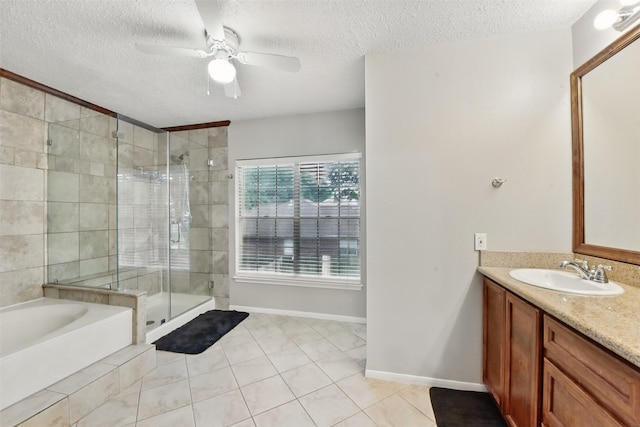 full bathroom with a garden tub, a textured ceiling, a stall shower, vanity, and tile patterned floors