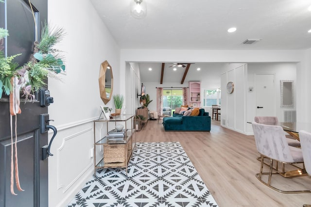 entrance foyer featuring ceiling fan, recessed lighting, wood finished floors, and visible vents