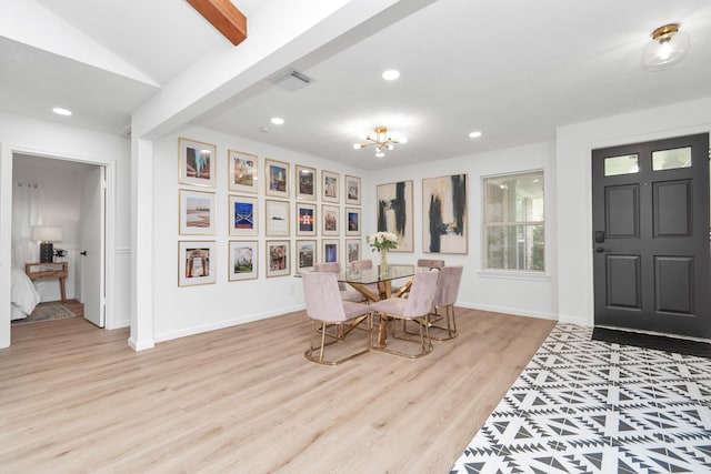 dining room featuring recessed lighting, visible vents, wood finished floors, and an inviting chandelier
