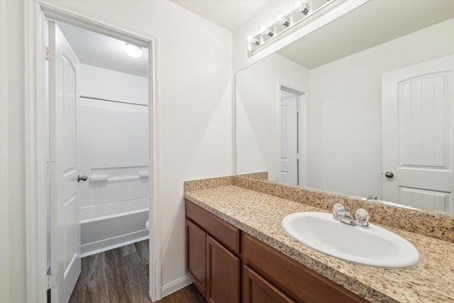 full bath featuring wood finished floors and vanity
