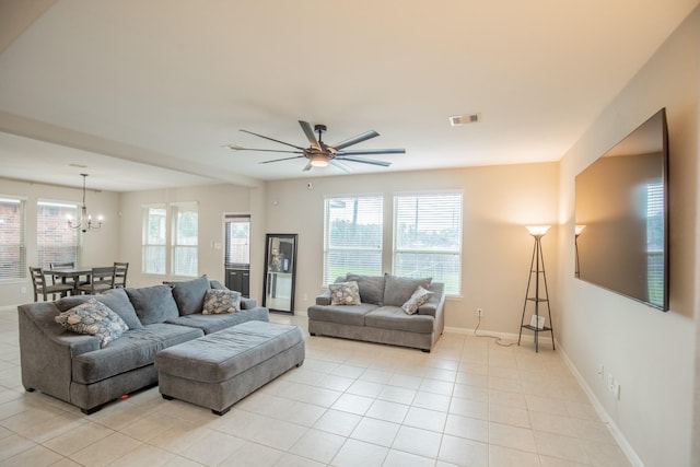 living area with visible vents, plenty of natural light, and light tile patterned floors