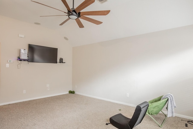 exercise room with carpet flooring, ceiling fan, baseboards, and lofted ceiling