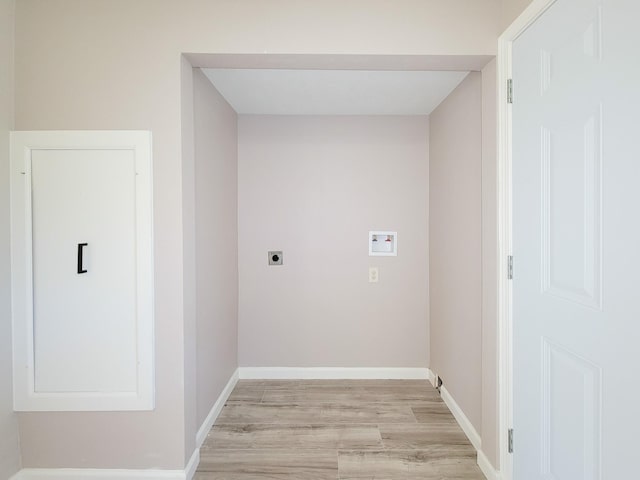 laundry room with washer hookup, laundry area, electric dryer hookup, baseboards, and light wood finished floors