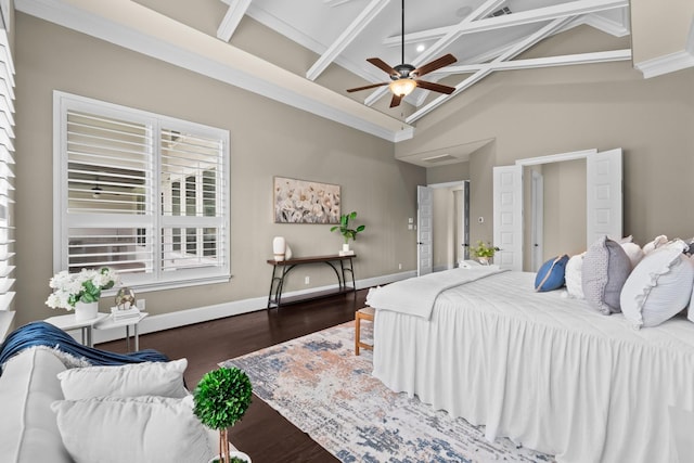 bedroom with a towering ceiling, wood finished floors, beam ceiling, baseboards, and coffered ceiling