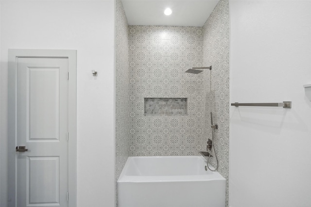 bathroom with bathing tub / shower combination