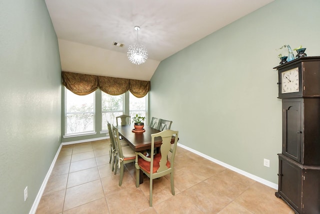 6822 Oaken Gate Way, Humble, TX 77338 - dining area featuring light tile patterned floors, baseboards, a chandelier, and lofted ceiling