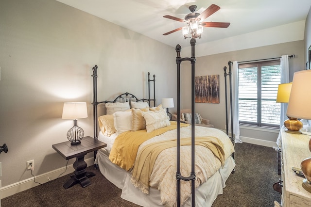 bedroom featuring dark carpet, baseboards, and ceiling fan