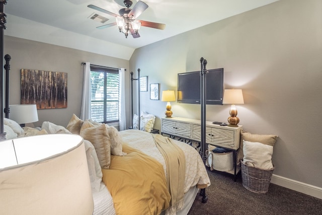 carpeted bedroom with baseboards, ceiling fan, vaulted ceiling, and visible vents