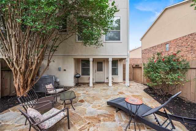 7824 Stoneyway Dr, Houston, TX 77040 - view of patio with a fenced backyard and central air condition unit