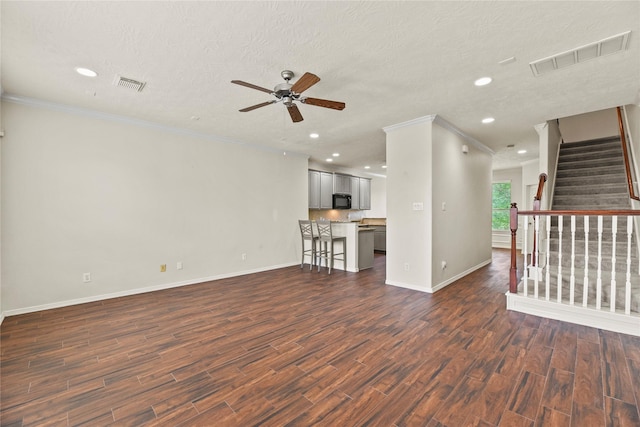 7824 Stoneyway Dr, Houston, TX 77040 - unfurnished living room with visible vents, a ceiling fan, baseboards, and ornamental molding