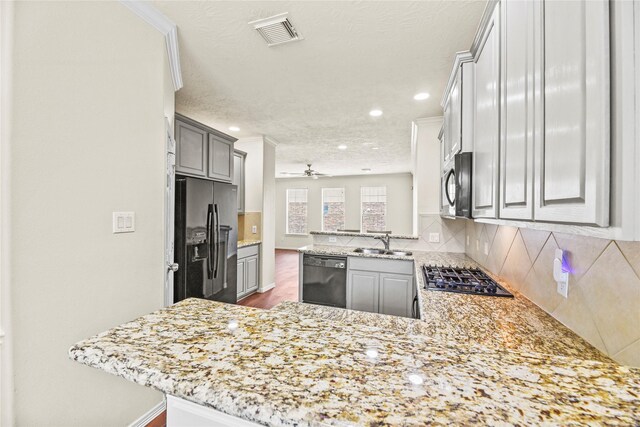 7824 Stoneyway Dr, Houston, TX 77040 - kitchen with a sink, dishwasher, gas stovetop, stainless steel refrigerator with ice dispenser, and visible vents