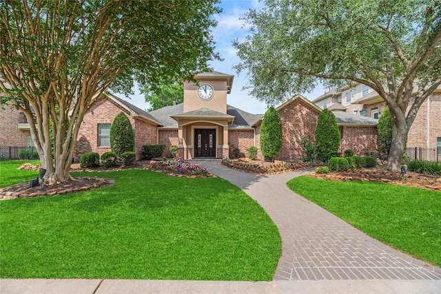 7824 Stoneyway Dr, Houston, TX 77040 - view of front of property featuring french doors, fence, a front yard, and brick siding