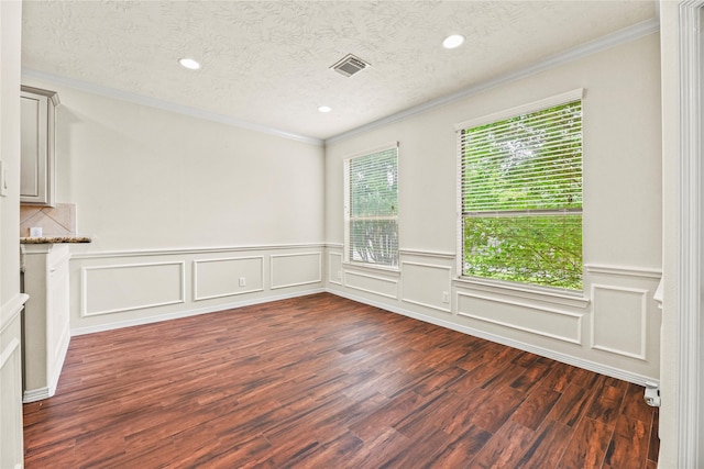 7824 Stoneyway Dr, Houston, TX 77040 - empty room with recessed lighting, a textured ceiling, visible vents, and dark wood finished floors