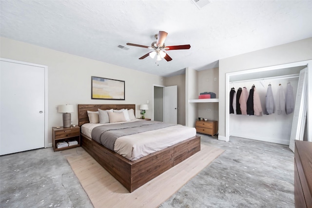 bedroom featuring ceiling fan, visible vents, and unfinished concrete flooring