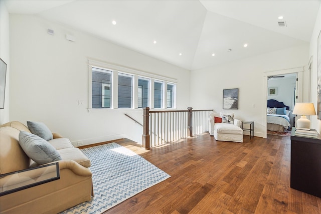 living room with baseboards, recessed lighting, wood finished floors, and visible vents