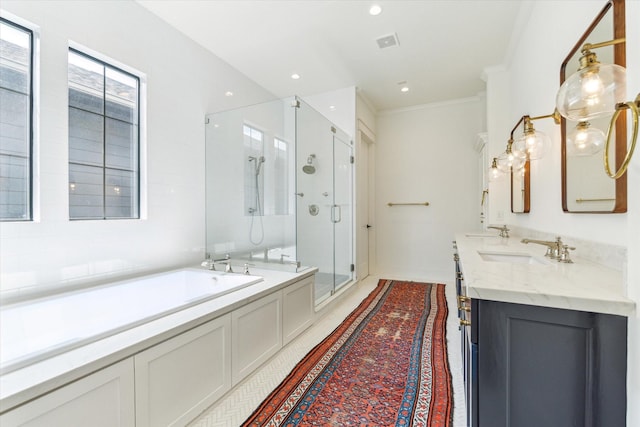 full bathroom featuring a garden tub, crown molding, tile patterned flooring, a stall shower, and vanity