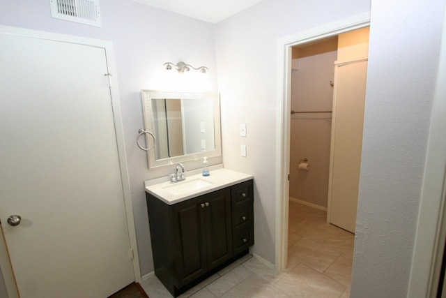 12024 Mighty Oak Dr Unit A, Houston, TX 77066 - bathroom featuring visible vents, tile patterned floors, and vanity