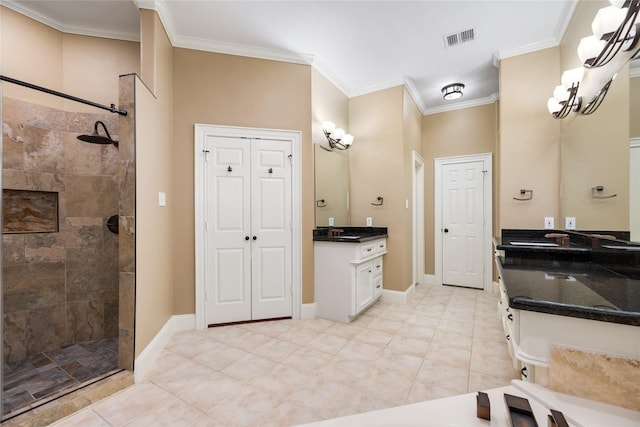 5811 Cimmaron Creek Ct, Spring, TX 77379 - full bathroom with a tile shower, vanity, visible vents, ornamental molding, and a closet