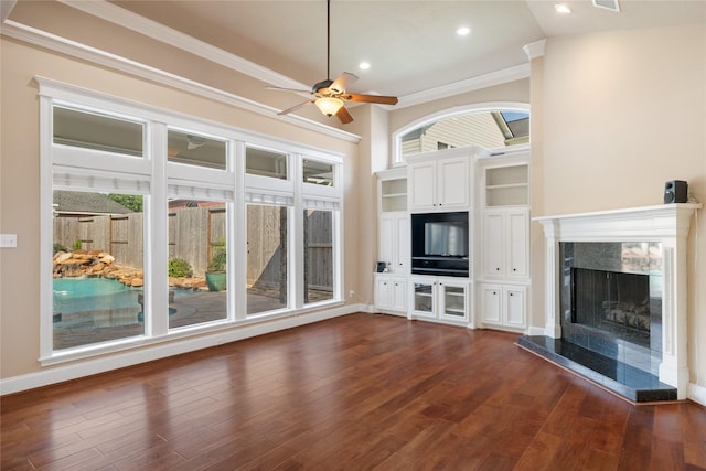 5811 Cimmaron Creek Ct, Spring, TX 77379 - unfurnished living room featuring ornamental molding, a fireplace, dark wood-style flooring, and ceiling fan