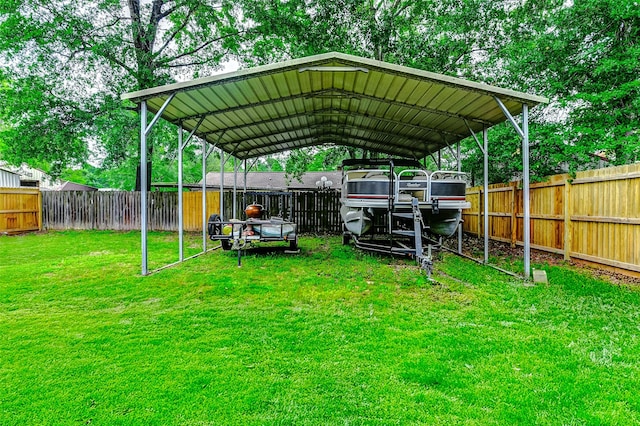 exterior space featuring a fenced backyard and a carport