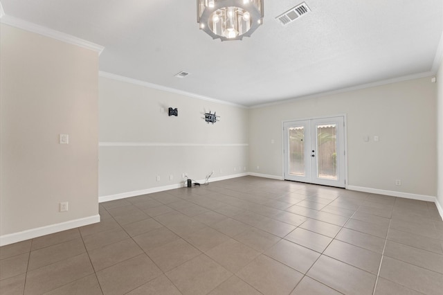 tiled spare room with baseboards, an inviting chandelier, french doors, and crown molding