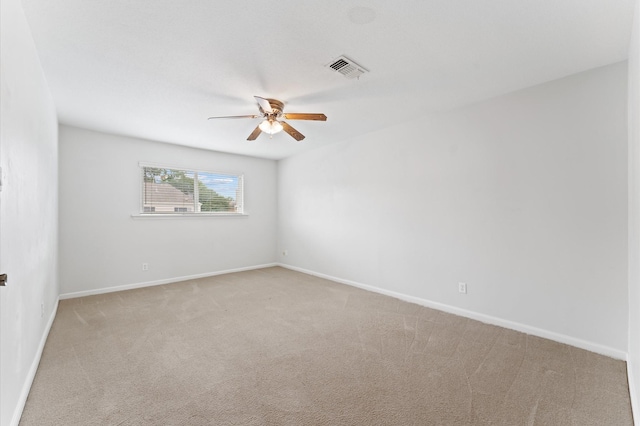 7545 Brompton St Unit 7545, Houston, TX 77025 - unfurnished room with a ceiling fan, light carpet, and baseboards