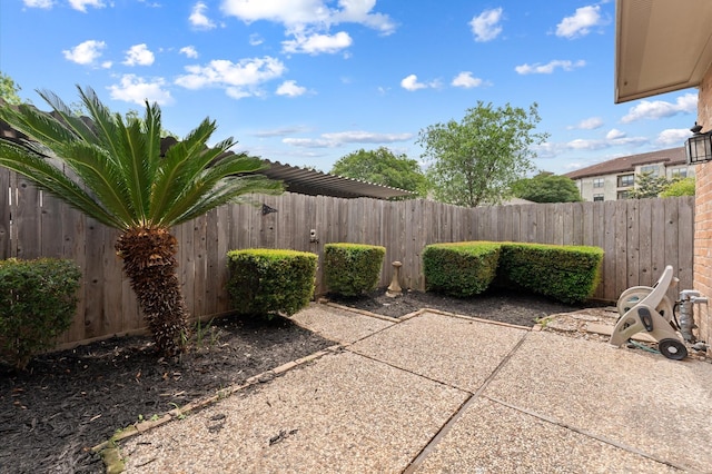 7545 Brompton St Unit 7545, Houston, TX 77025 - fenced backyard with a patio