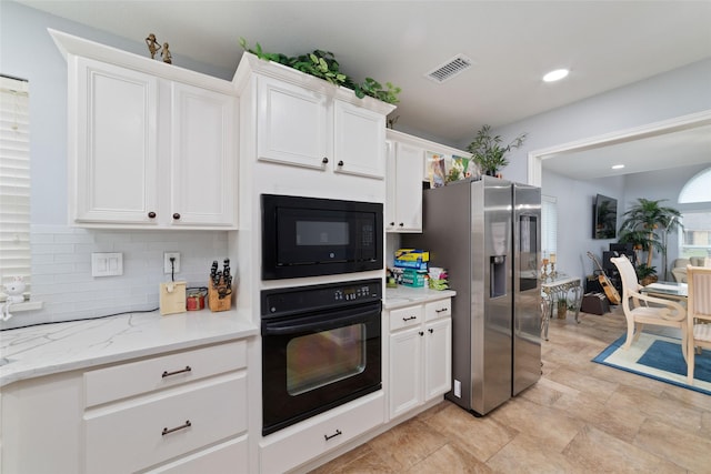 kitchen with backsplash, white cabinetry, visible vents, and black appliances