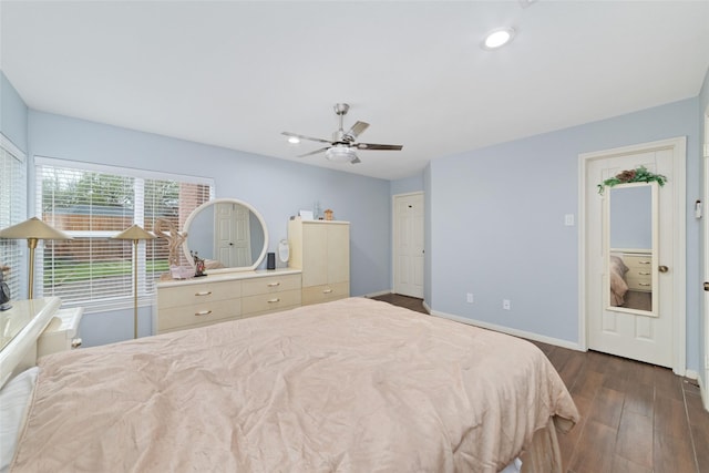 bedroom with a ceiling fan, baseboards, recessed lighting, and dark wood-type flooring