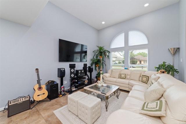 living area featuring recessed lighting and light tile patterned flooring