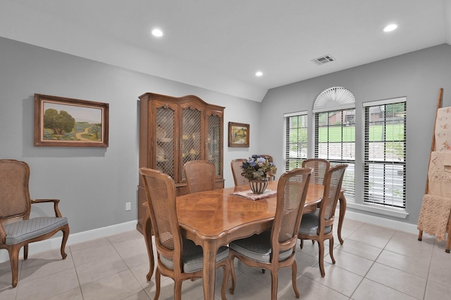 5 Highland Hollow Dr, Conroe, TX 77304 - dining area with recessed lighting, baseboards, light tile patterned flooring, and vaulted ceiling