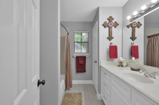 5 Highland Hollow Dr, Conroe, TX 77304 - bathroom featuring tile patterned flooring, vanity, shower / bath combo with shower curtain, and baseboards