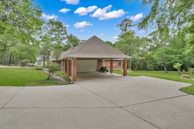 5 Highland Hollow Dr, Conroe, TX 77304 - view of side of home with an attached garage, a yard, concrete driveway, and brick siding